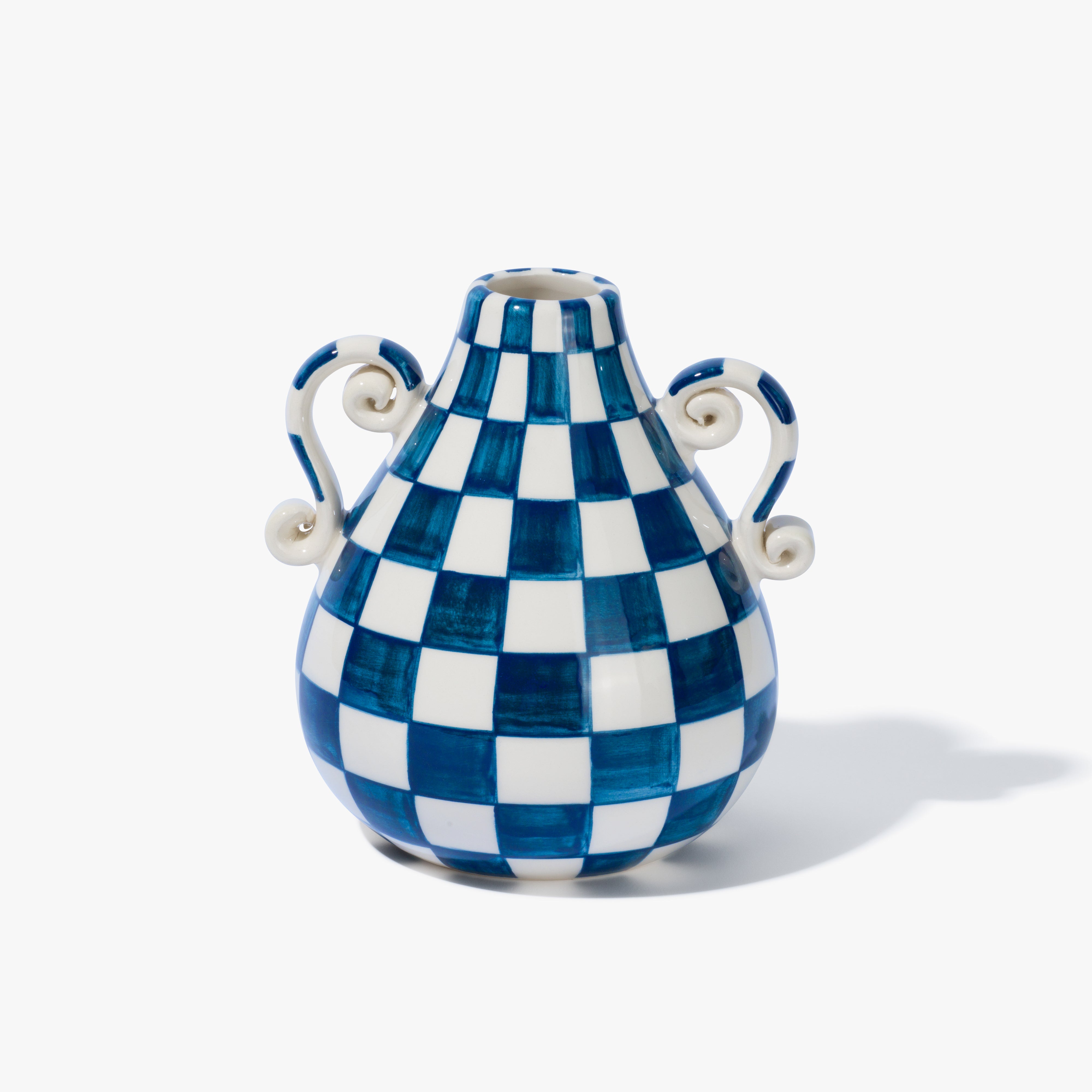This is a picture of a Vaisselle Amphora ceramic vase that is a blue and white checkered vase in a beautifully sculptured shape with two handles.