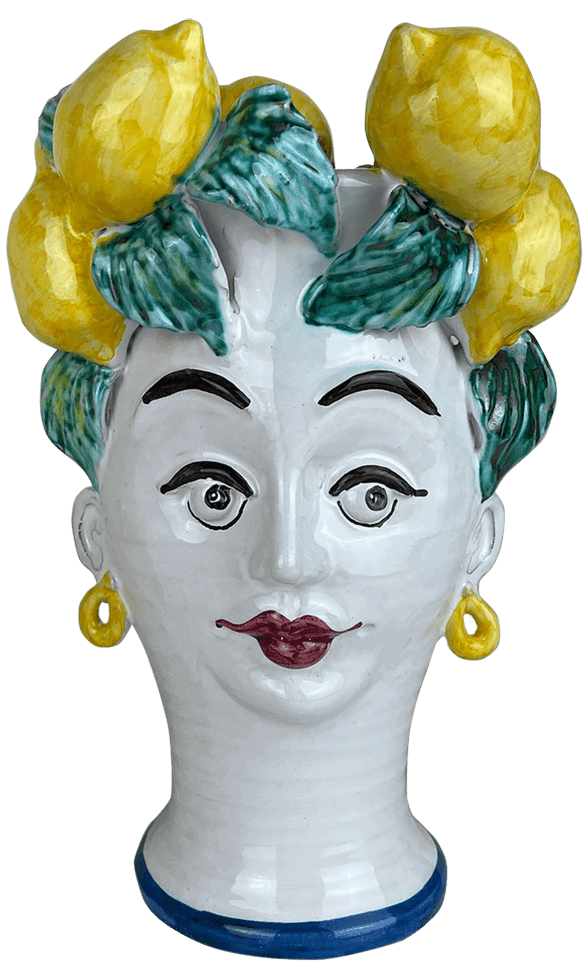 A ceramic Sicilian style vase of a ladies head decorated with lemons. The vase/ centrepiece is hand painted and  features yellow lemons, green leaves, red lips, yellow earrings and black facial features. 