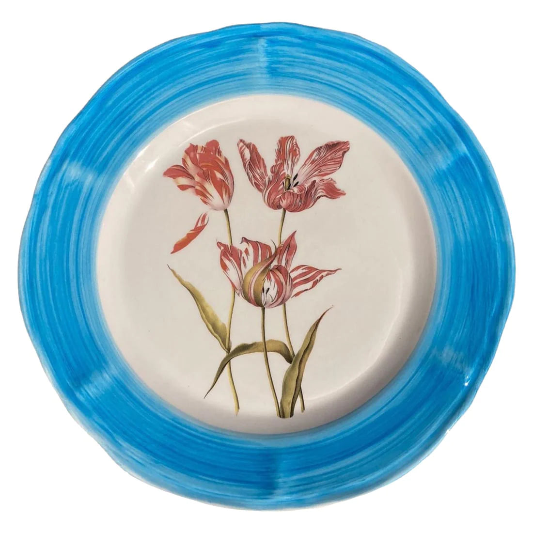 A ceramic plate with a bright blue hand painted rim and a flower motif in the centre.