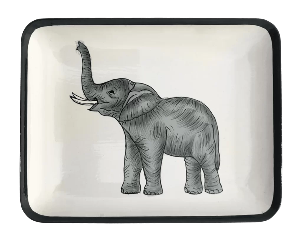 A small off white coloured iron tray with a handpainted image of an little elephant. The tray is finished with a black border.