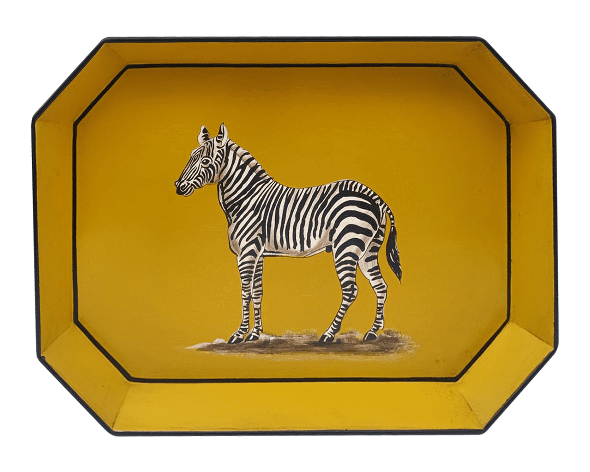 A rectangular iron tray that features a hand-painted illustration of a Zebra on a mustard yellow background with black edges..